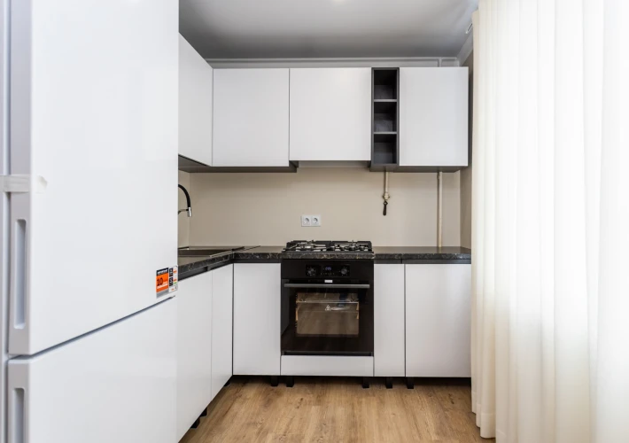 Apartament modern cu 2 dormitoare și living spațios, reparație nouă, complet mobilat – zonă dezvoltată, posibil credit ipotecar5